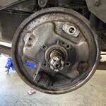 Passenger side after old shoes and hub removed